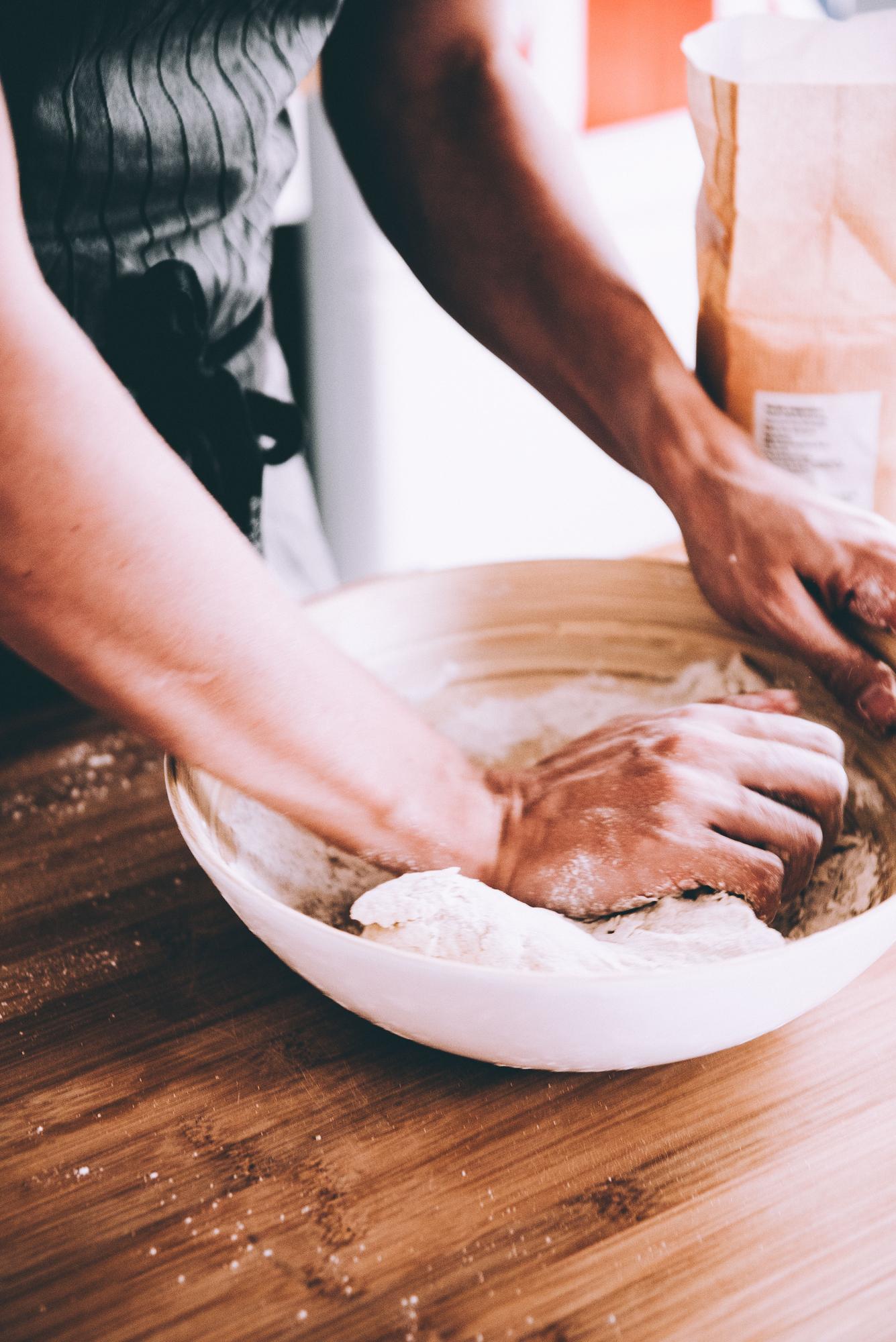 Workshop chef demonstrating dough technique
